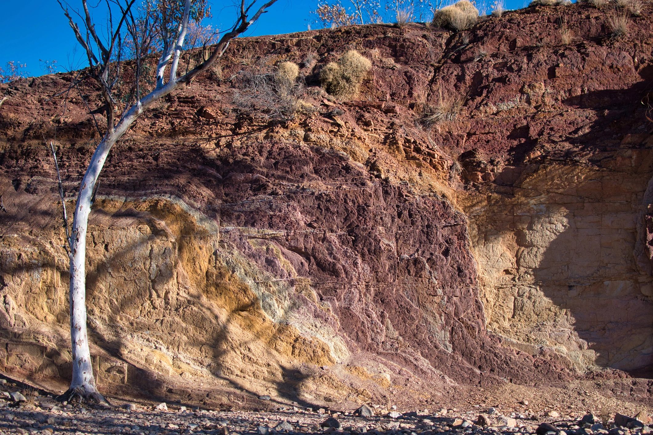 Layered rock formation showing distinct sediment strata